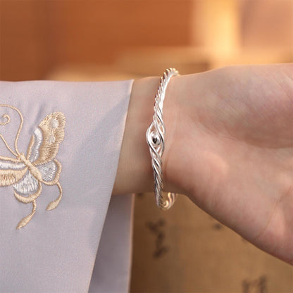 Chinese style multi-line braided sterling silver bracelet
