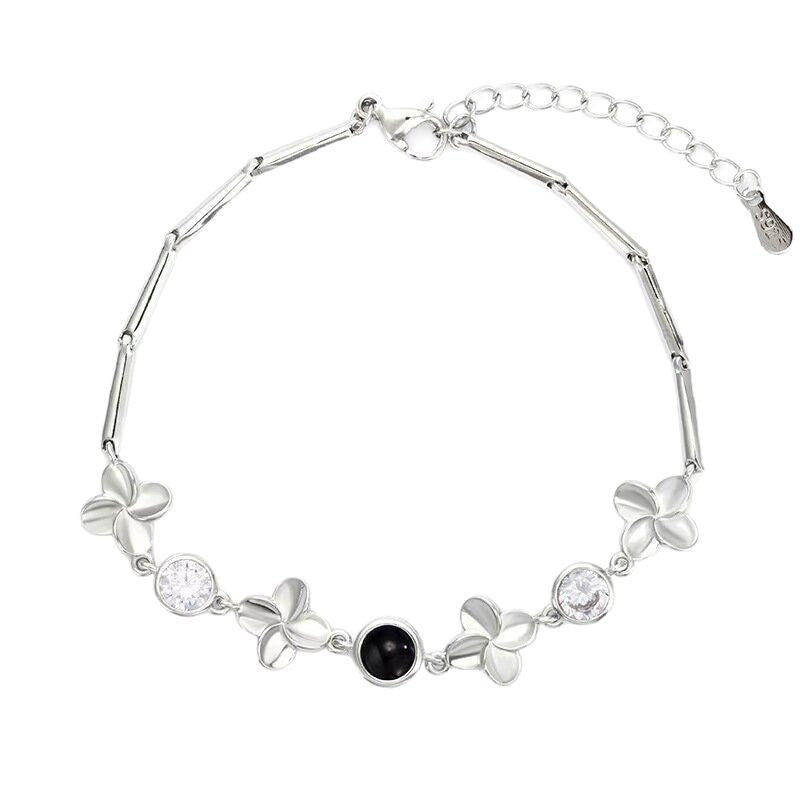 Pulsera de trébol de cuatro hojas con proyección de fotos 