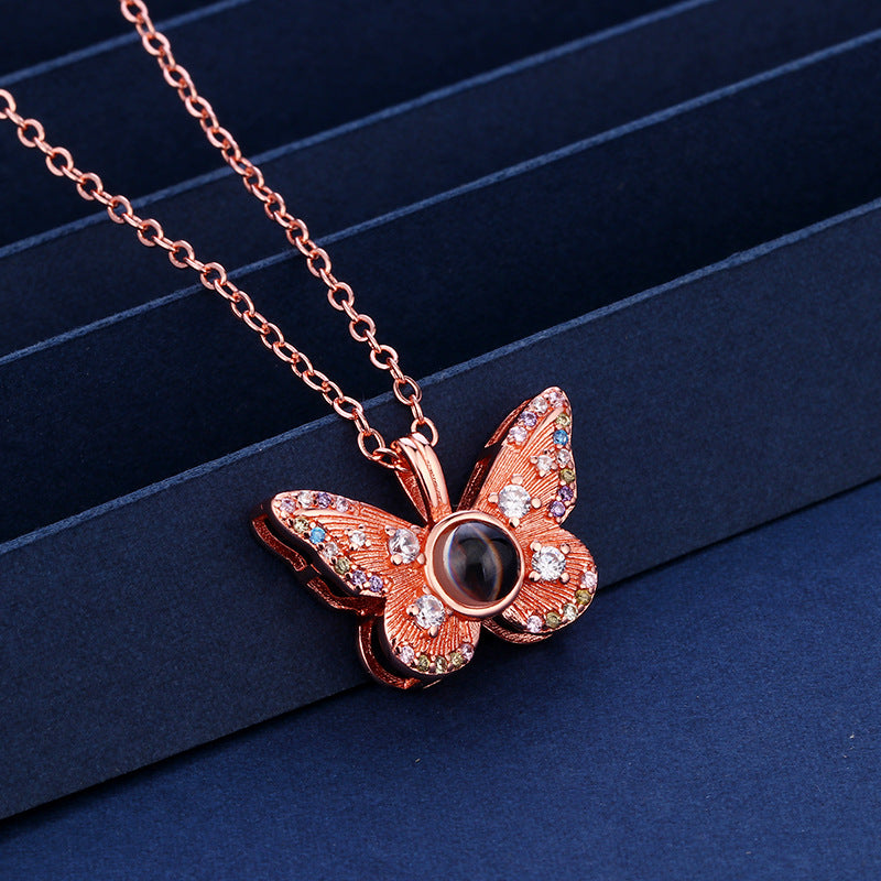 Photo projection colored diamond butterfly necklace