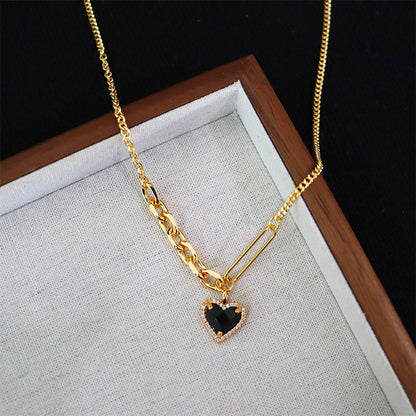 Collar de corazón negro de alta gama para mujer.