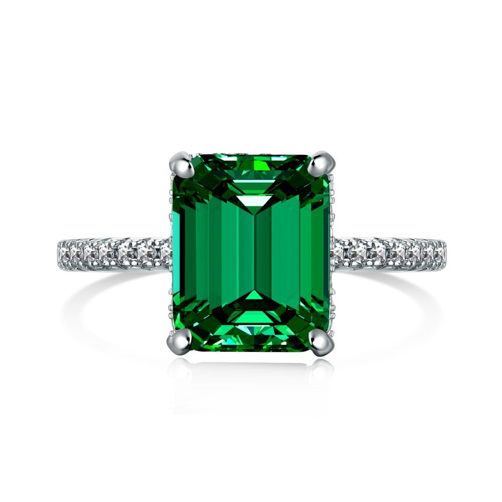 Anillo retro de esmeralda con circonita de alta gama