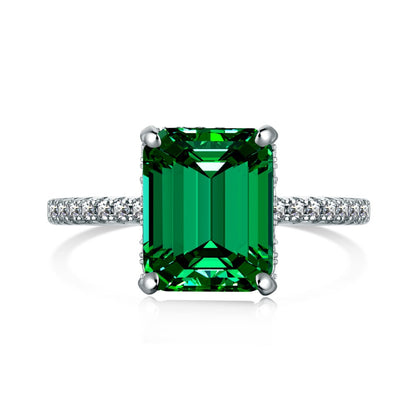 Anillo retro de esmeralda con circonita de alta gama