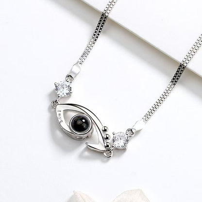 Pulsera de ojo de demonio con proyección de fotos 