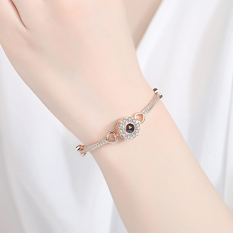 Pulsera de girasol con circonitas y proyección de fotos 