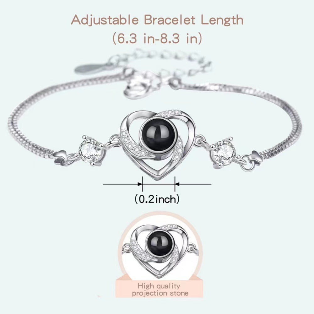 Pulsera con proyección de fotos de circonitas en forma de corazón 