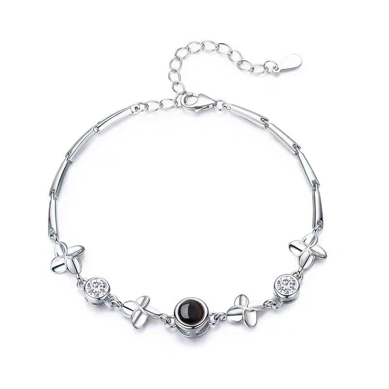 Pulsera de flores de cuatro hojas con proyección de fotos