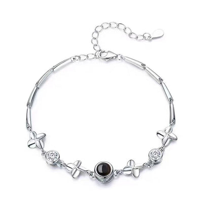 Pulsera de flores de cuatro hojas con proyección de fotos