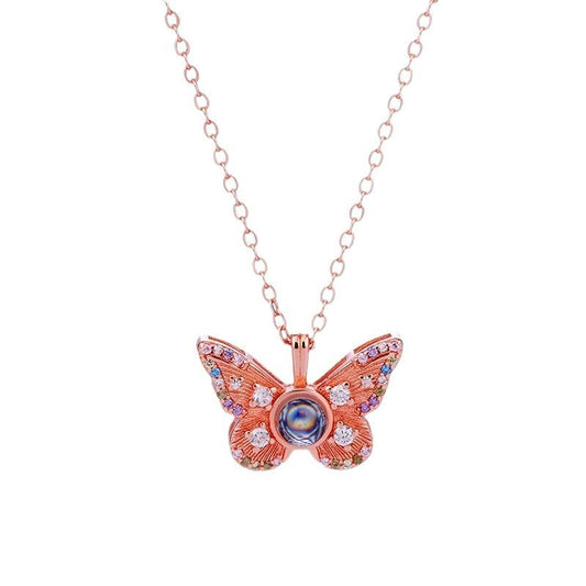 Collar de mariposa de diamantes de colores con proyección de fotos