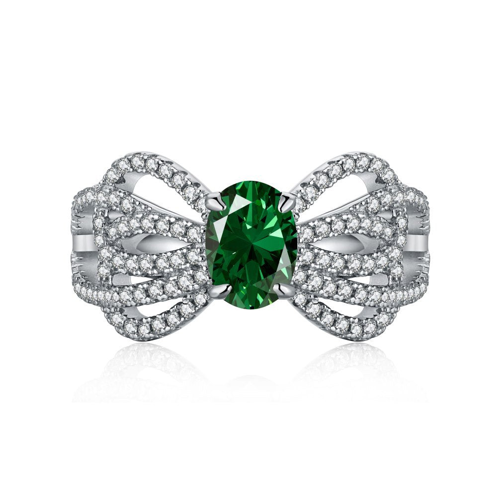 Anillo retro de esmeralda con circonita de alta gama