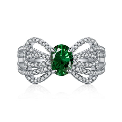 Anillo retro de esmeralda con circonita de alta gama