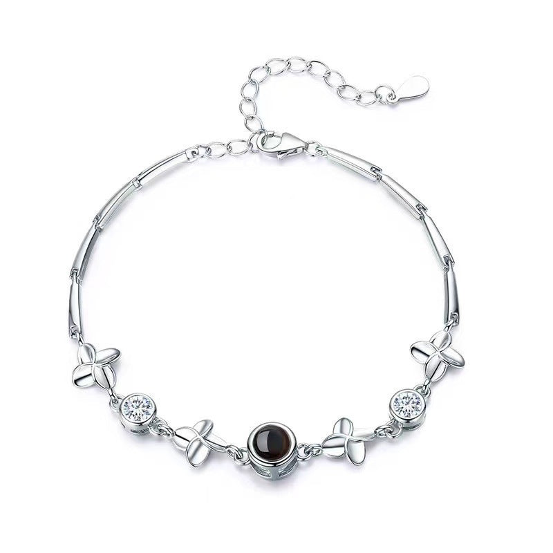 Pulsera de trébol de cuatro hojas con proyección de fotos 