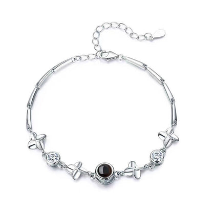 Pulsera de trébol de cuatro hojas con proyección de fotos 