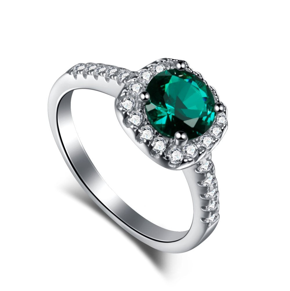 Anillo retro de esmeralda con circonita de alta gama