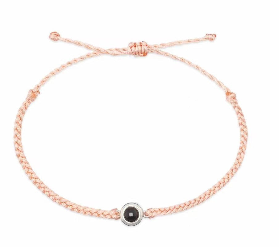 Pulsera de cuerda tejida con proyección de fotos 