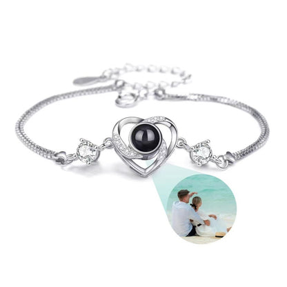 Pulsera con proyección de fotos de circonitas en forma de corazón 