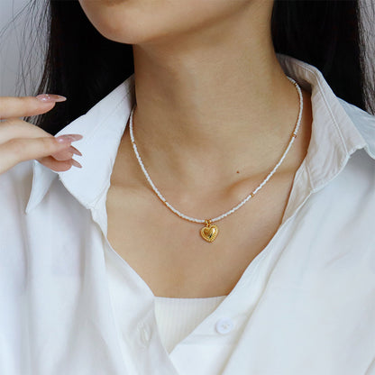 Collar de corazón con cuentas de mijo simple de alta gama para mujer 