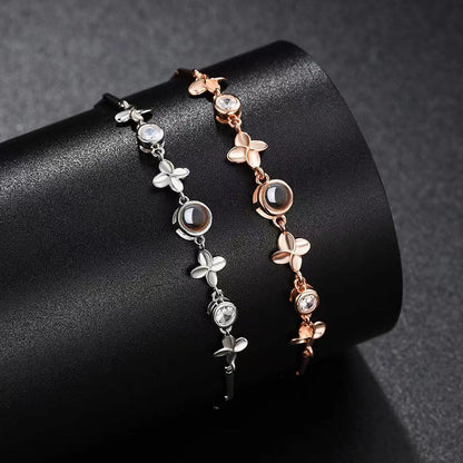 Pulsera de trébol de cuatro hojas con proyección de fotos 