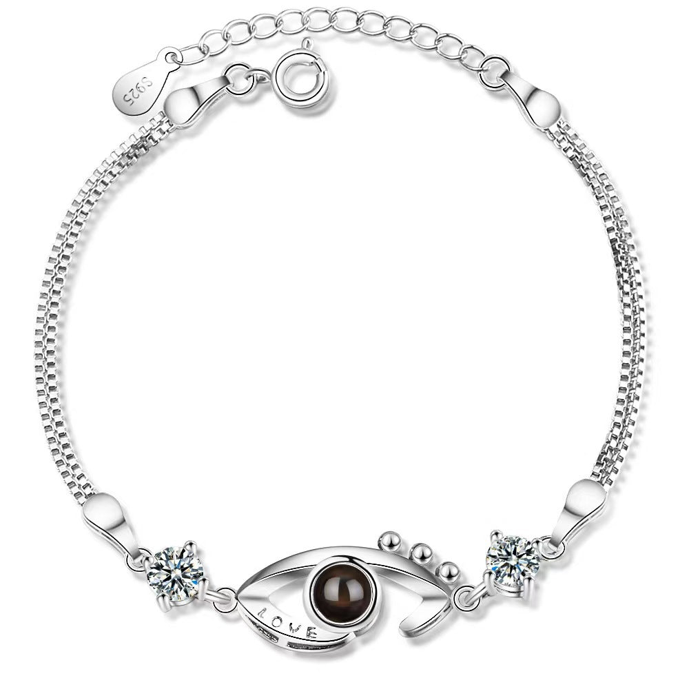 Pulsera de ojo de demonio con proyección de fotos 