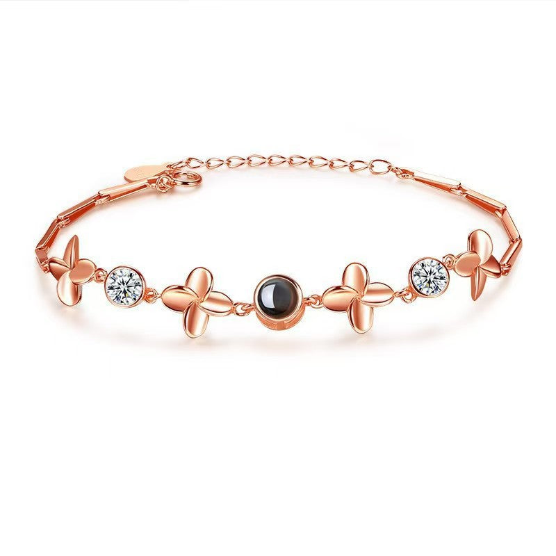 Pulsera de trébol de cuatro hojas con proyección de fotos 