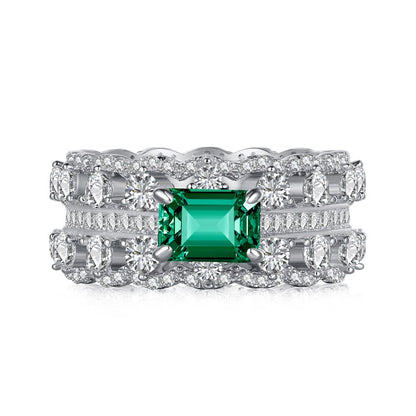Anillo retro de esmeralda con circonita de alta gama