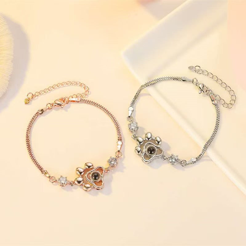 Pulsera con foto y proyección de huellas de perro 