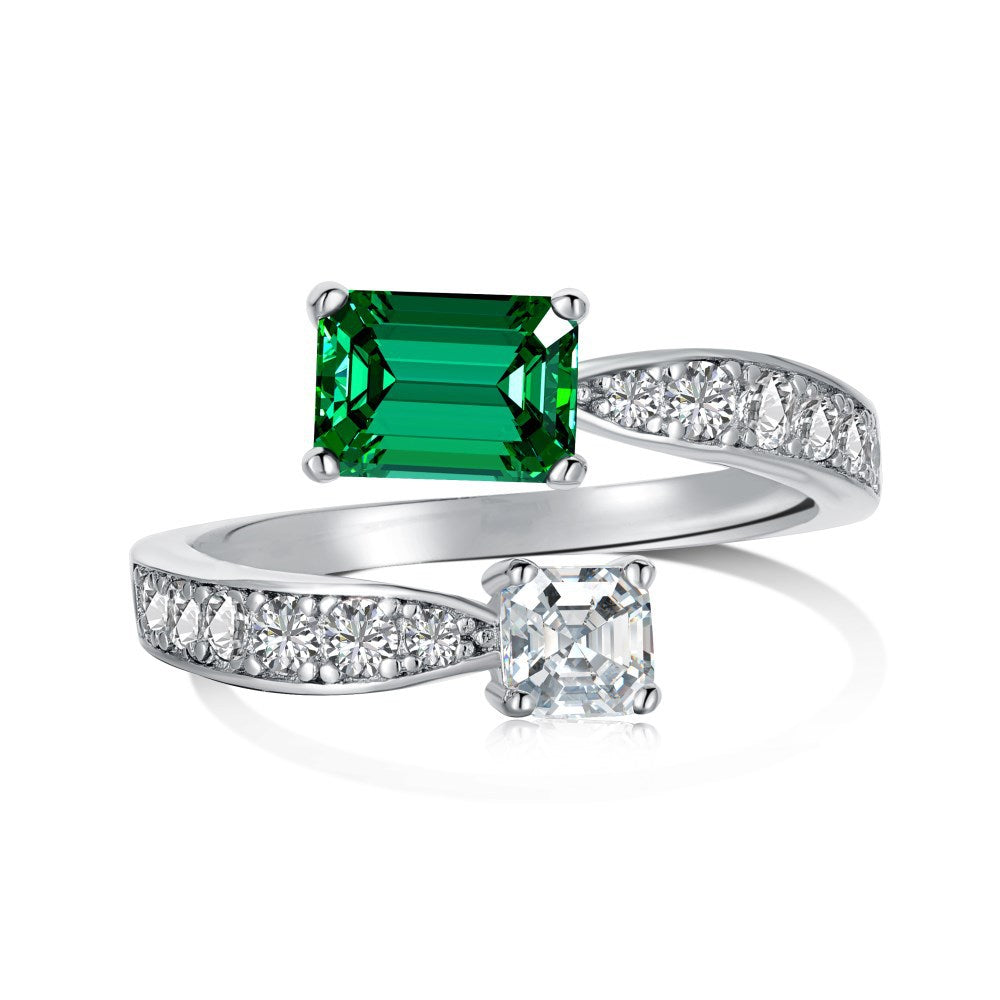 Anillo retro de esmeralda con circonita de alta gama