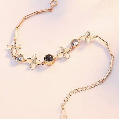 Pulsera de trébol de cuatro hojas con proyección de fotos 