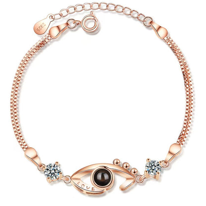 Pulsera de ojo de demonio con proyección de fotos 