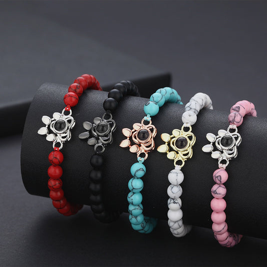 Pulsera con proyección de fotos y huella de perro