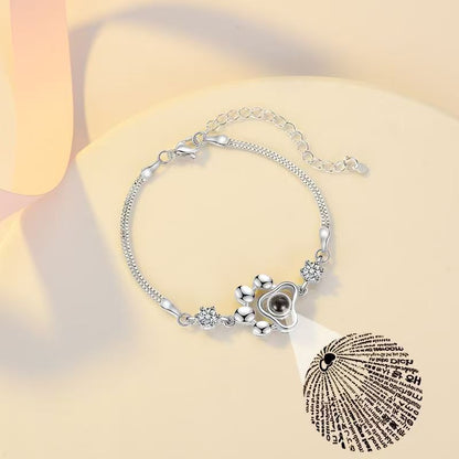 Pulsera con foto y proyección de huellas de perro 