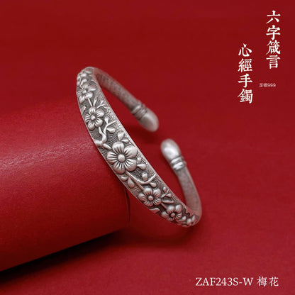 Pulsera de plata de ley con relieve floral étnico