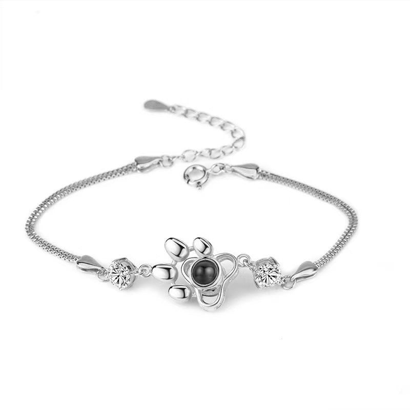 Pulsera con foto y proyección de huellas de perro 