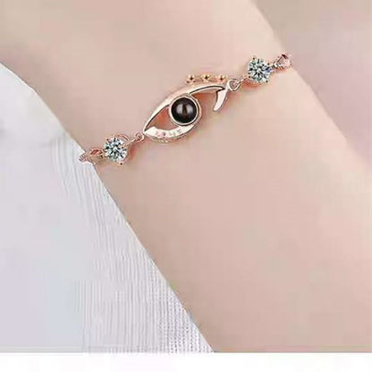 Pulsera de ojo de demonio con proyección de fotos 