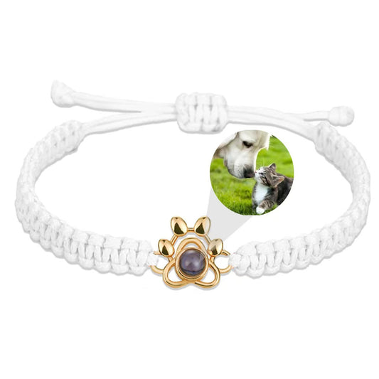 Pulsera tejida con proyección de fotos de pata de perro 