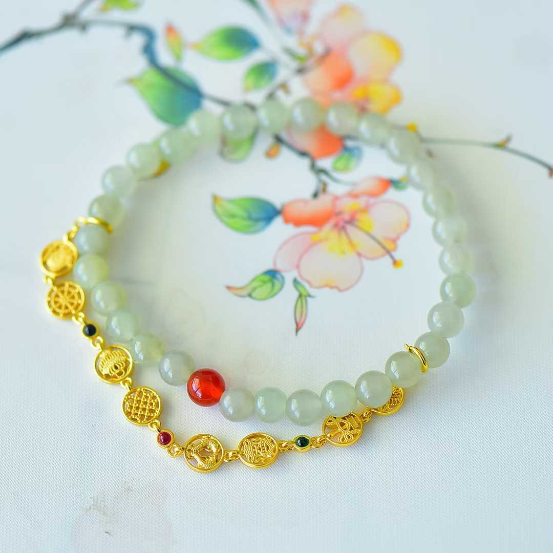 Side view of jade beaded bracelet - traditional eight treasures design
