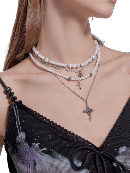 Baroque pearl cross necklace with layered chains