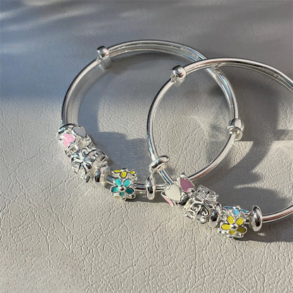 China A pair of sterling silver heart circle bracelets for children