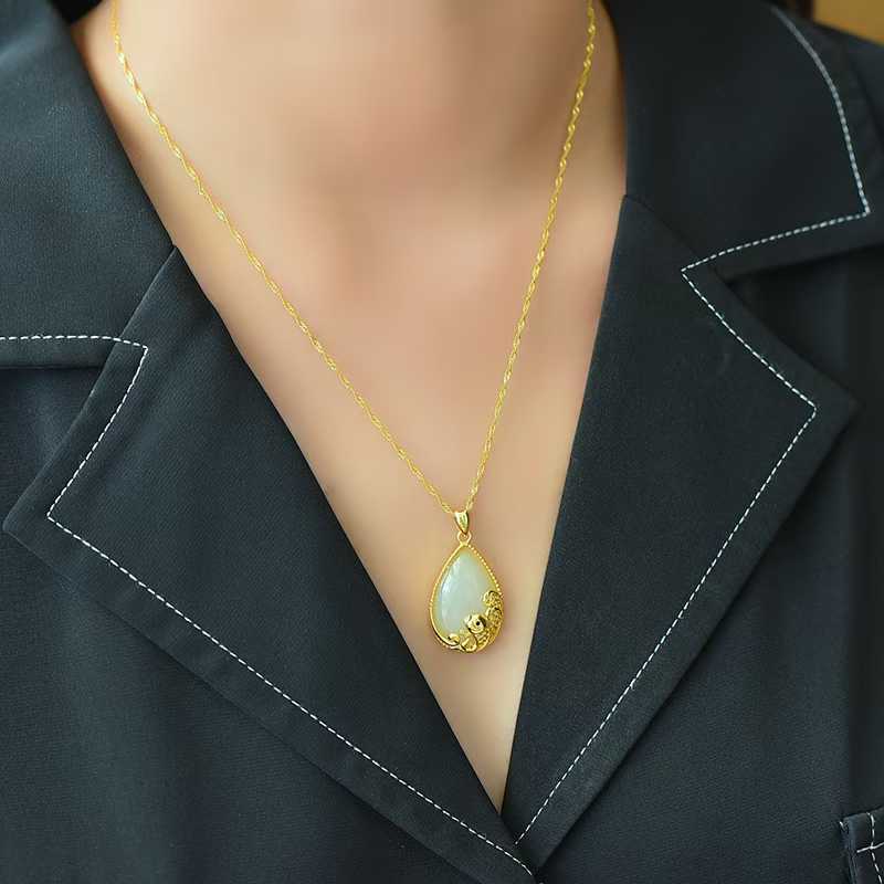 925 Silver Inlaid Hetian Nephrite "Year of Abundance (Fish) & Teardrop" Pendant