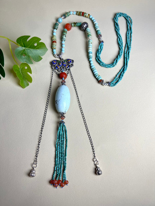 Collar de suéter con cuentas de barril turquesa de moda