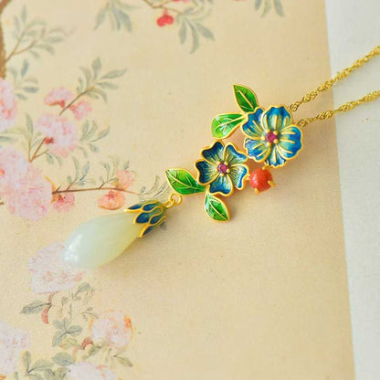 Close-up of magnolia and Ruyi carving on Hetian jade pendant
