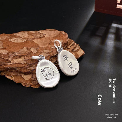 Colgante de plata con el símbolo de la paz del zodíaco chino